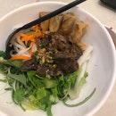 dry beef noodles w/ spring rolls