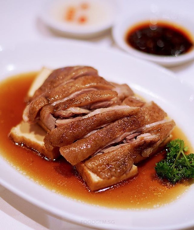 Teochiew Sliced Soy Duck with silken tofu cooked in a rich and savoury broth.