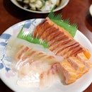 Freshly sliced sashimi upon order.