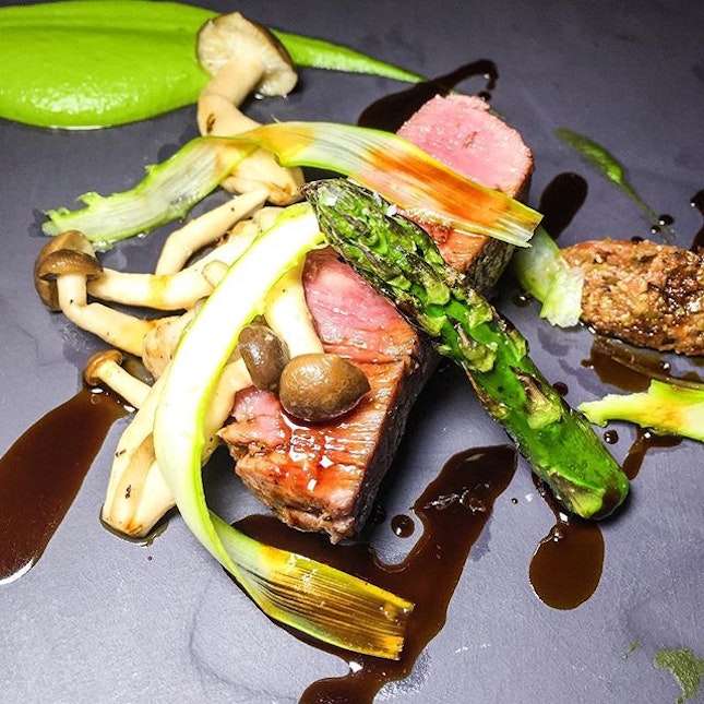 Grilled Beef Tenderloin ($36), served with mushroom, asparagus and condiments.