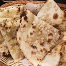 Garlic Butter Naan 7++ Awadhi Magaj Naan 8++