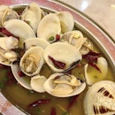 Huge juicy clams in a spicy stock!