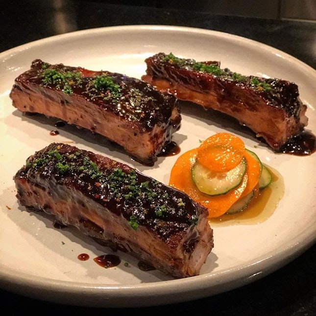 Pork ribs that are so tender and juicy smothered with a medjool dates paste, paired with carrot and cucumber pickles.