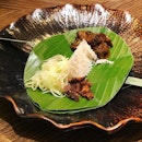 The one dish: Coconut rice cooked in claypot served with beef curry and beef rinds.