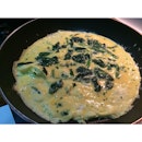 2 egg beaten w milk omelette with spinach, thyme, Bragg's gluten free liquid amino (soy sauce replacement), a dash of ground spicy seasoning, some Dead Sea salt too.