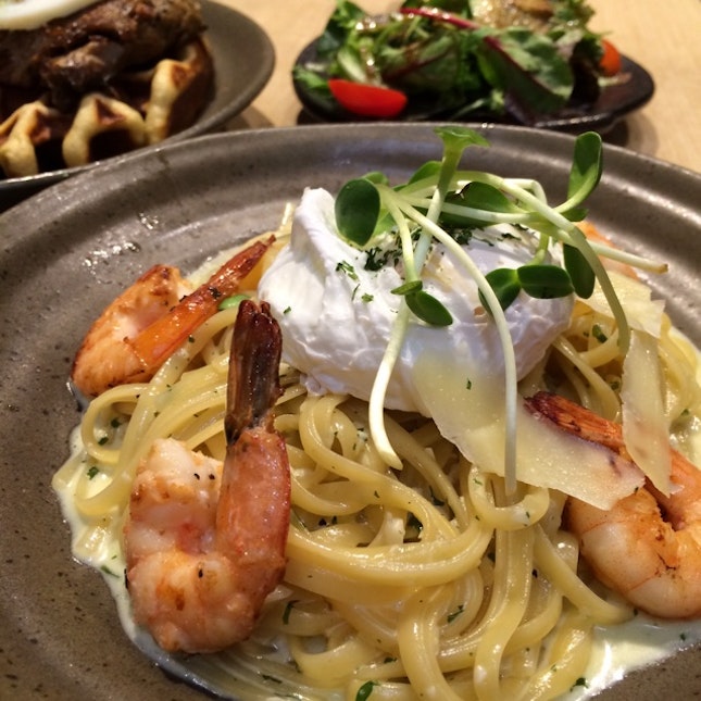 Creamy Shrimp Linguini with Poached Egg in White Sauce and Parmesan Cheese $16