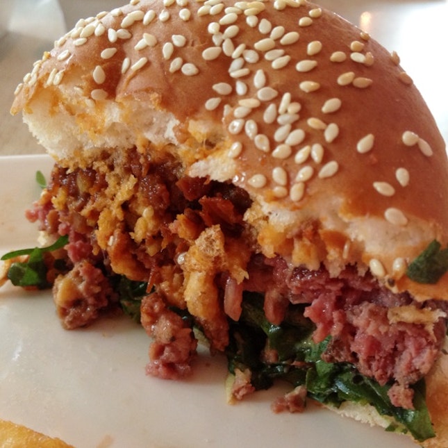 half eaten wild rocket beef burger ($18.50++)