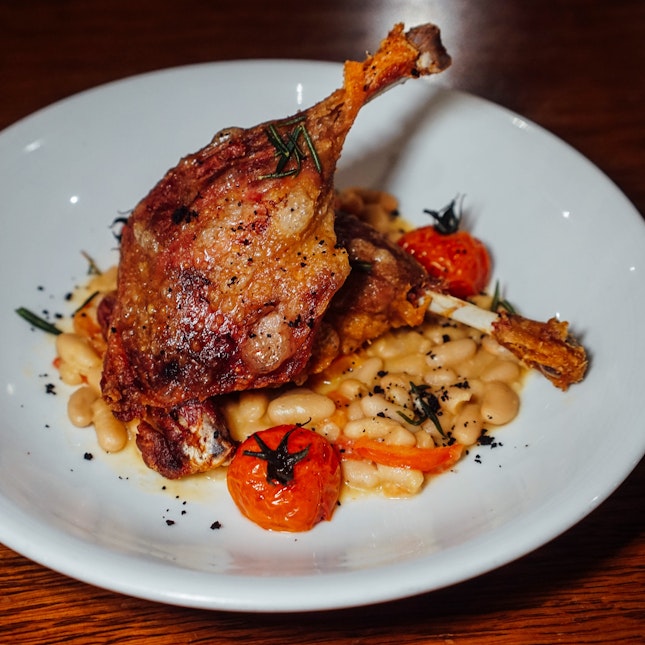 Duck Leg Confit with Cannellini & Cherry Tomatoes