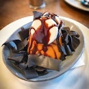 Orange lava cake with dark chocolate ribbon...sounds and looks better than it actually tastes.